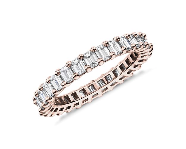This lab grown diamond emerald-cut eternity ring celebrates the brilliance of love, surrounded by the timeless shine of 14k rose gold.