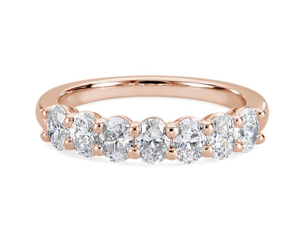 Classic and brilliant, this beautiful lab grown diamond band features seven brilliant oval-cut lab grown diamonds set in enduring 14k rose gold.