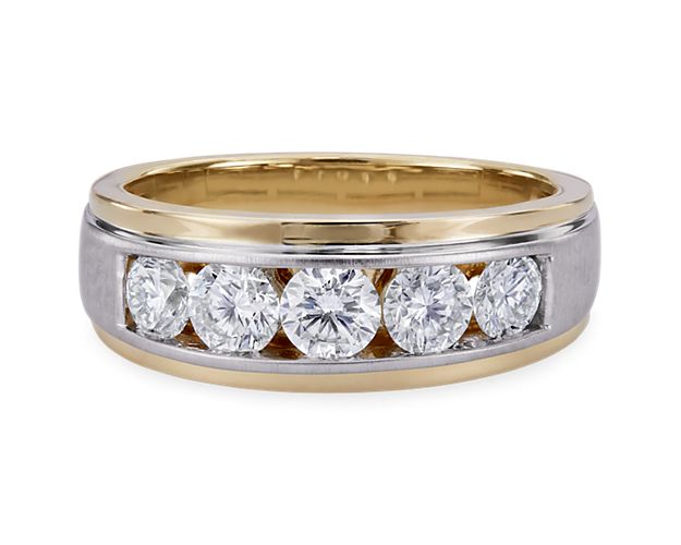 Two-tone men’s wedding band with channel-set lab diamonds.