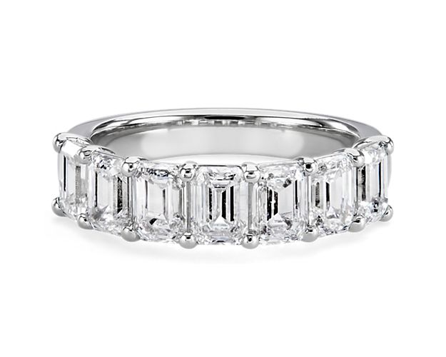Lab grown diamond ring in platinum, featuring seven emerald-cut diamonds. 