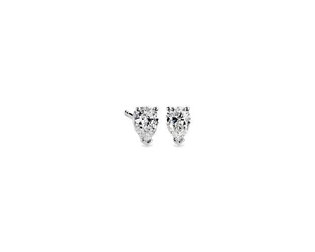 Beautifully matched, these stud earrings feature near-colorless pear shape lab grown diamonds set in 14k white gold four-prong settings with double-notched friction backs.