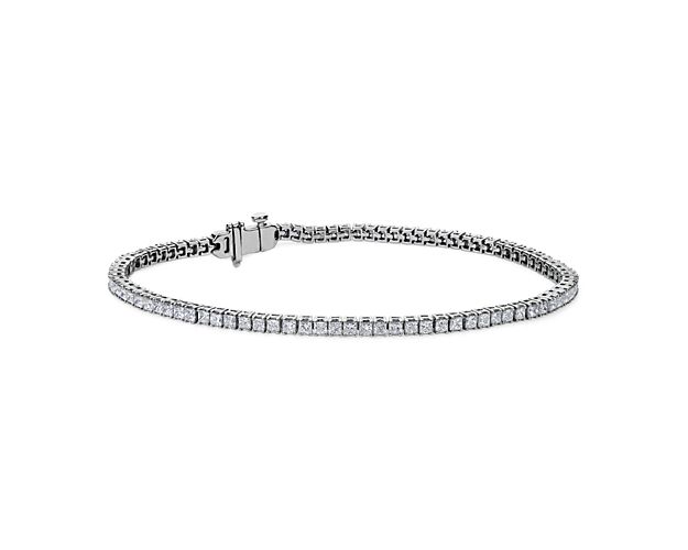 Brilliance defined, this tennis bracelet features brilliant cut round lab-grown diamonds set in a four-prong straight line design of 14k white gold.