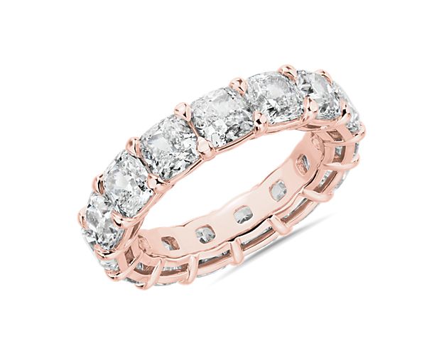 An unbroken circle of dazzling cushion-cut lab created diamonds enlivens every angle of this 8 ct. tw. eternity ring set in enduring 14k rose gold.