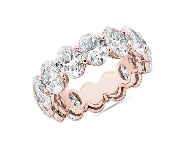 Express never-ending love with this romantic eternity ring featuring 8 ct. tw. of stunning oval-cut diamonds arrange in a low-profile 14k rose gold setting that promises lasting lustrous beauty.