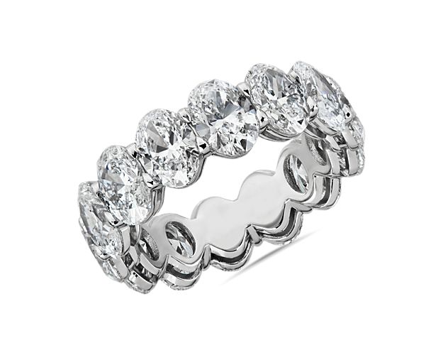 Express never-ending love with this romantic eternity ring featuring 8 ct. tw. of stunning oval-cut diamonds arrange in a low-profile platinum setting that promises lasting lustrous beauty.