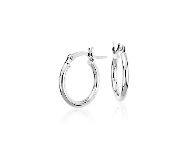 A style essential, these petite hoop earrings are crafted from 14k white gold tubing for a polished, lightweight look, finished with a latch back closure.