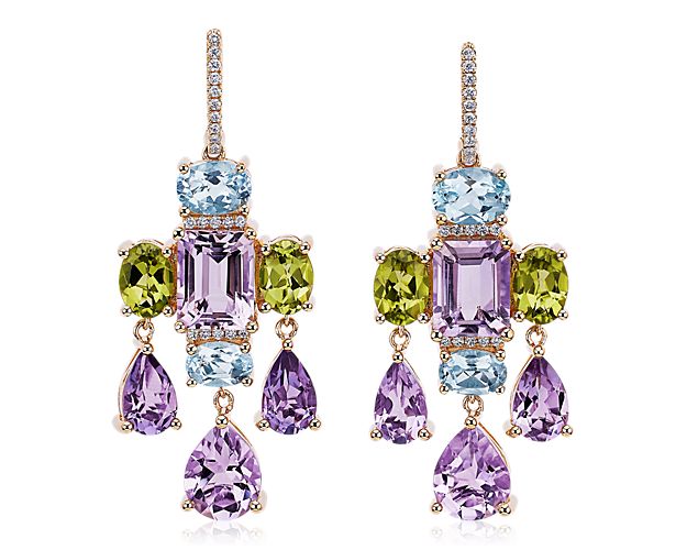 A symphony of pink amethyst, peridot and sky blue topaz stones dangle beautifully from these intricate chandelier earrings. They are designed in lustrous 14k yellow gold to complete the look with timeless quality and luxury.