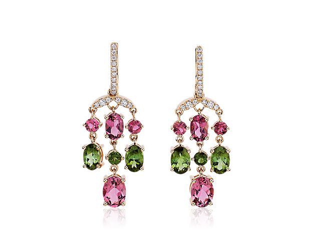 Gorgeous pink and green tourmaline stones cascade gracefully from these chandelier earrings, catching the light as they move. The 14k yellow gold design promises a luxurious look that lasts.