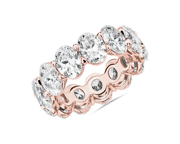 Express never-ending love with this romantic eternity ring featuring 9 1/2 ct. tw. of stunning oval-cut diamonds arrange in a low-profile 14k rose gold setting that promises lasting lustrous beauty.