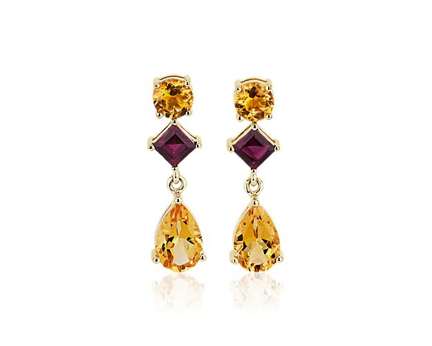 Channel regal style with these stunning drop earrings featuring shimmering citrine and rhodolite stones in a variety of eye-catching cuts. The bold hues of the stones are beautifully complemented by the 14k yellow gold setting.
