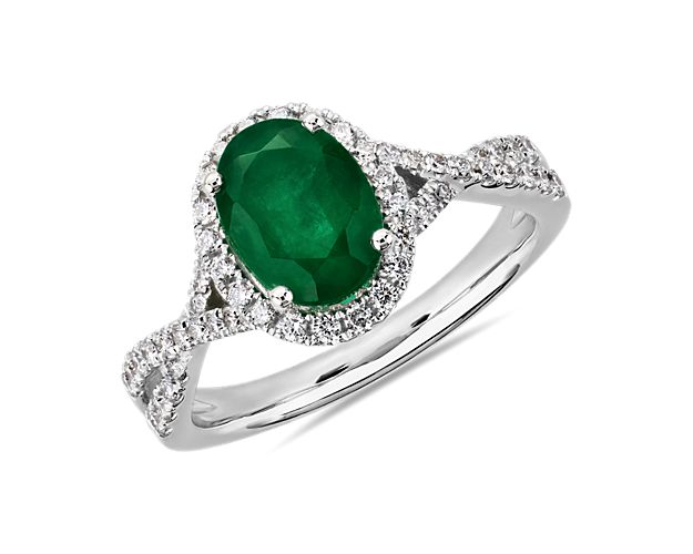 Oval Emerald and Diamond Halo Twist Ring (8x6mm)
