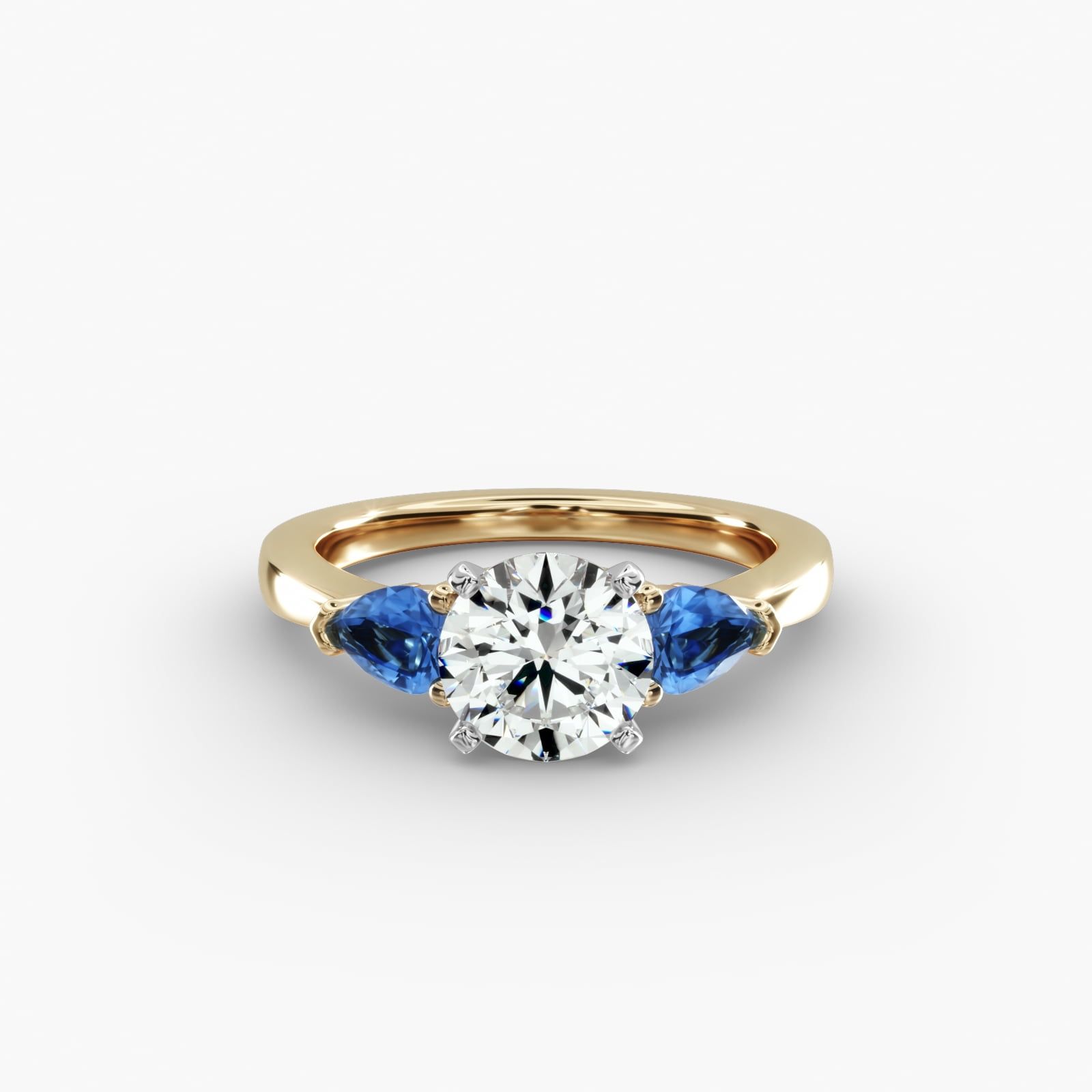 Classic Pear Shaped Sapphire Engagement Ring in 14K Yellow Gold