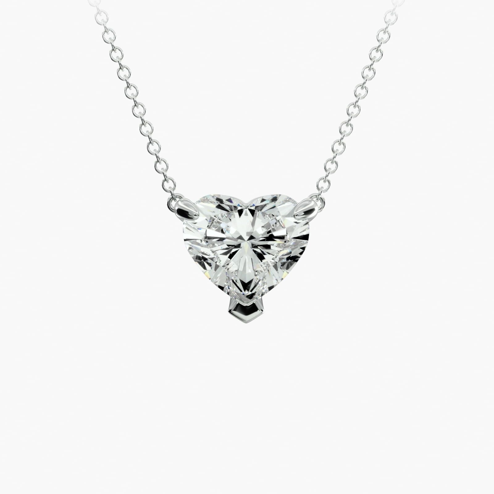 Heart cut diamond pendant in platinum setting 