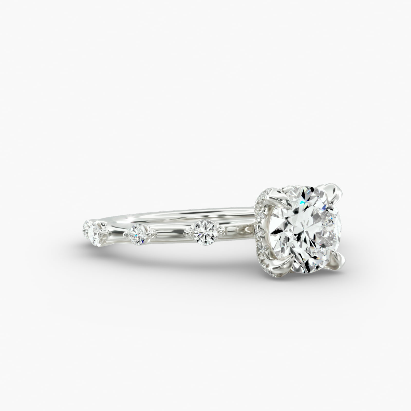 Floating Station Engagement Ring Diamond Basket Head