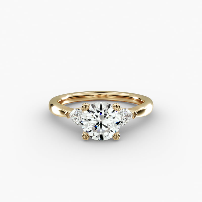 Pear Sidestone Diamond Engagement Ring in 14k Yellow Gold (1/4 ct. tw.)