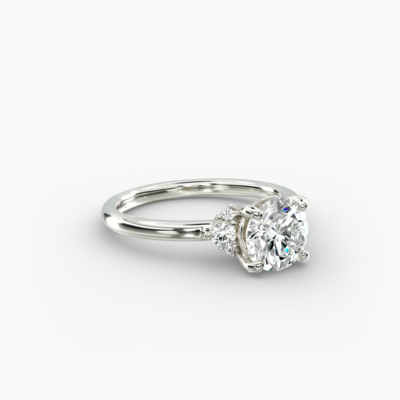 Petite Three Diamond Engagement Ring in Platinum (1/10 ct. tw.)
