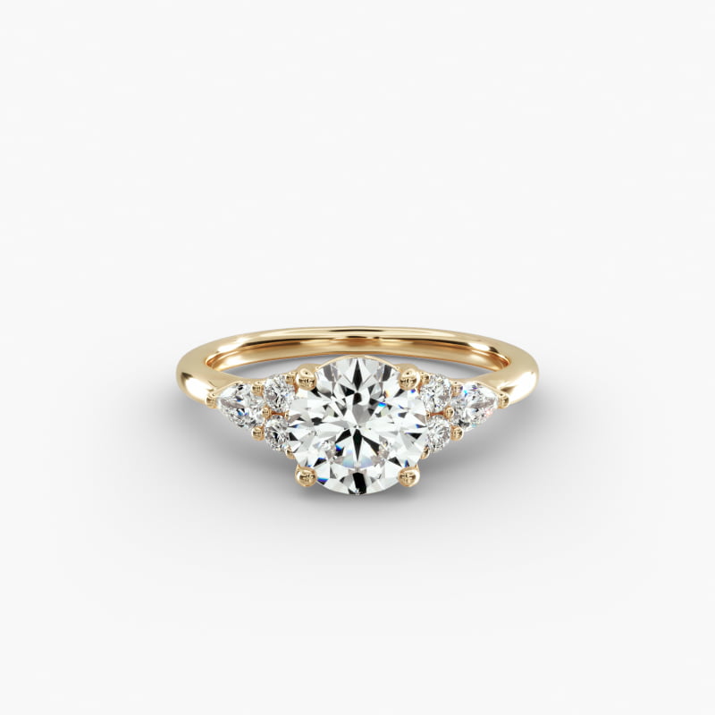Petite Pear and Round Diamond Engagement Ring in 14k Yellow Gold (1/4 ct. tw.)
