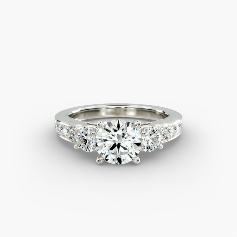 Channel Set Diamond Three Stone Engagement Ring In Platinum