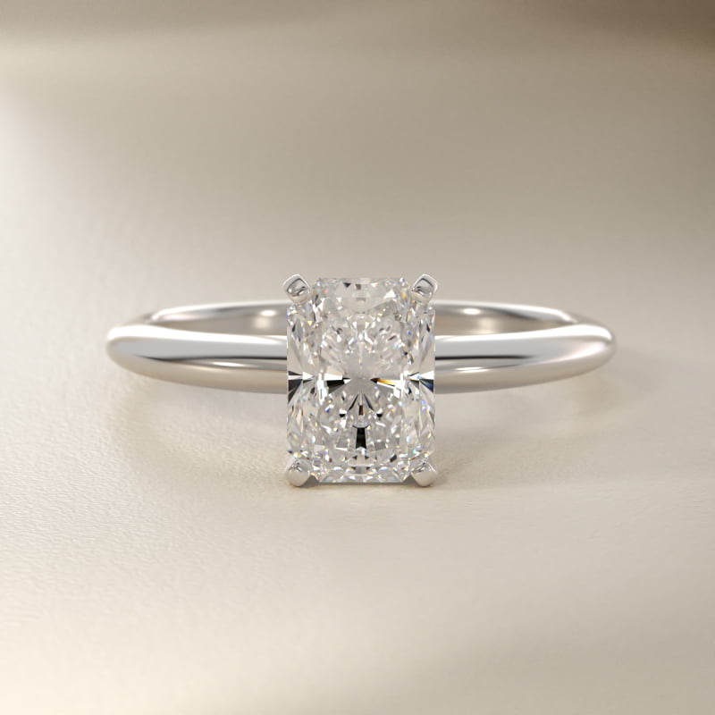 Classic Four Prong Solitaire Engagement Ring in Platinum