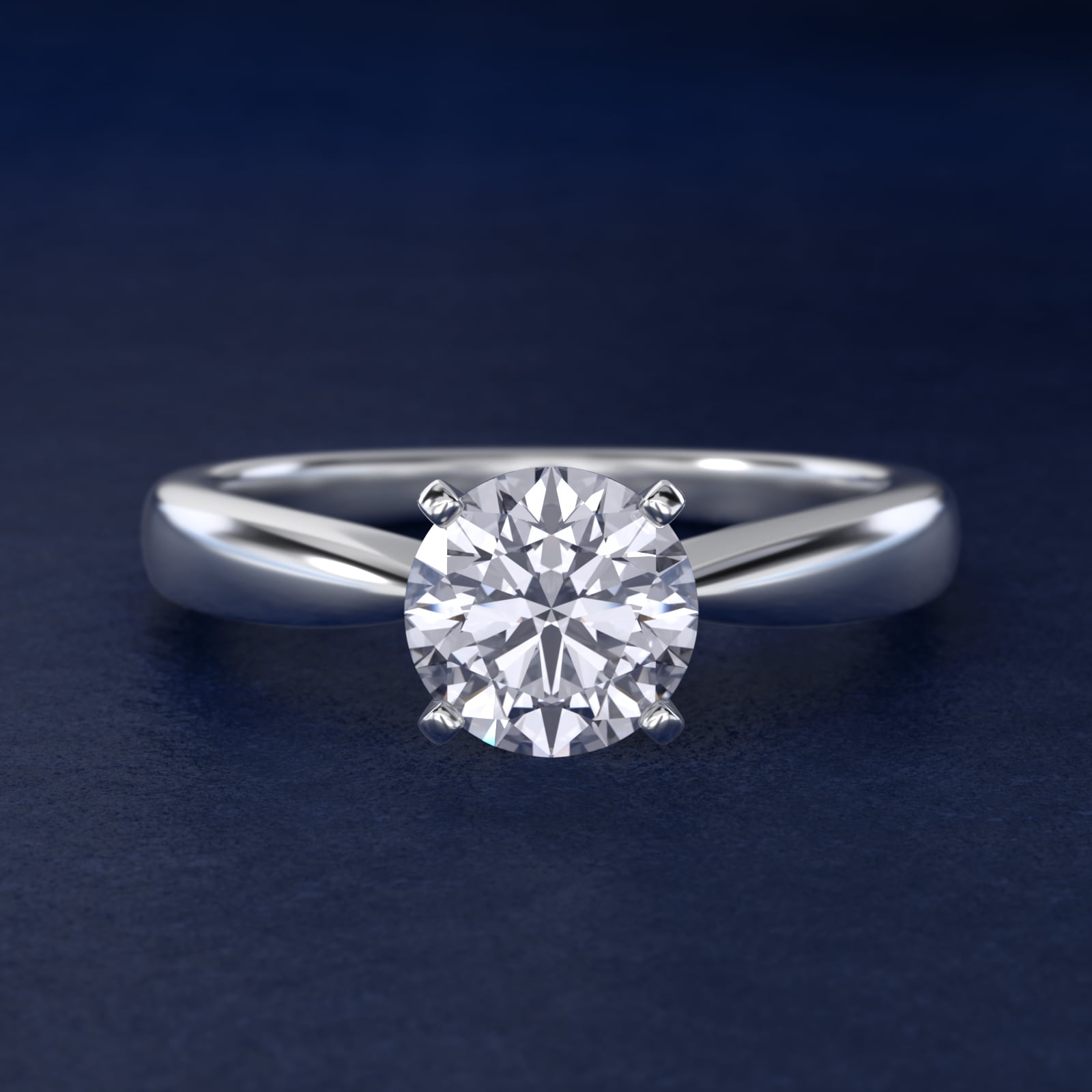 Classic Tapered Solitaire Engagement Ring in 18k White Gold