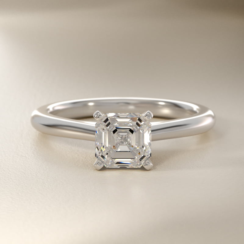 Petite Solitaire Engagement Ring in Platinum