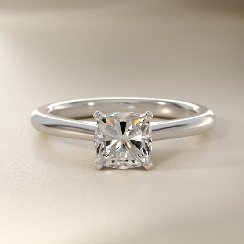 Petite Solitaire Engagement Ring in Platinum