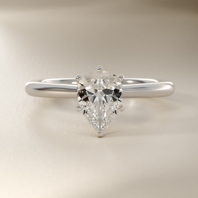 Petite Solitaire Engagement Ring in Platinum