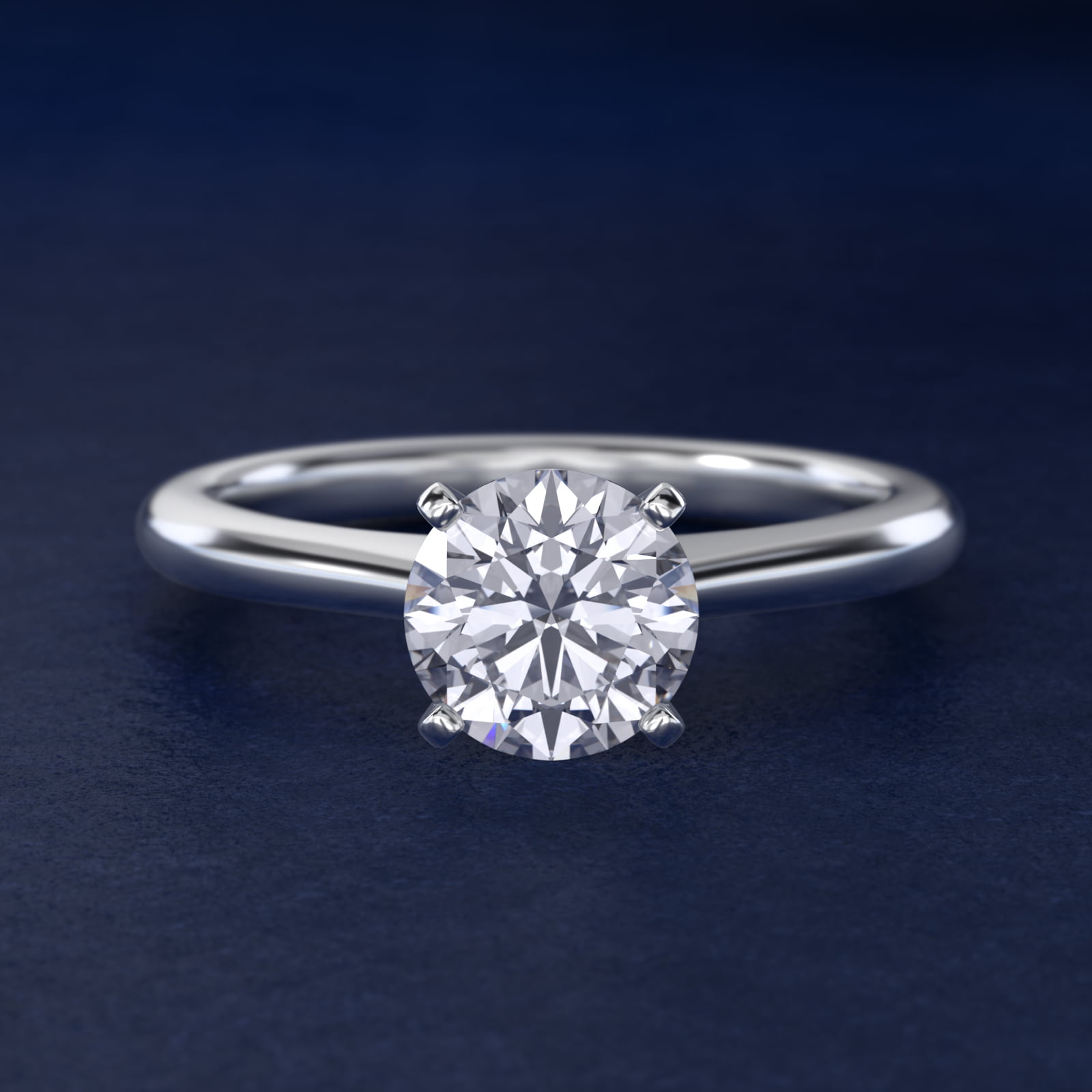 Petite Solitaire Engagement Ring in Platinum
