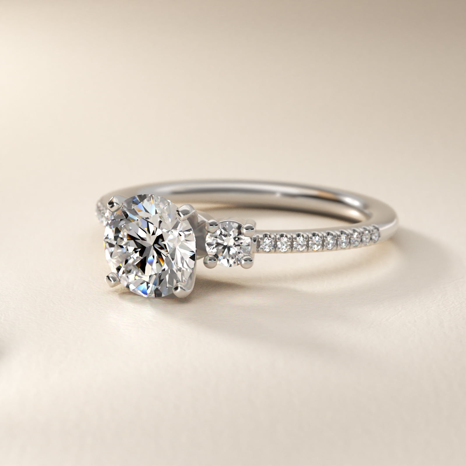 Petite Micropavé Trio Diamond Engagement Ring in 18k White Gold (1/5 ct. tw.)