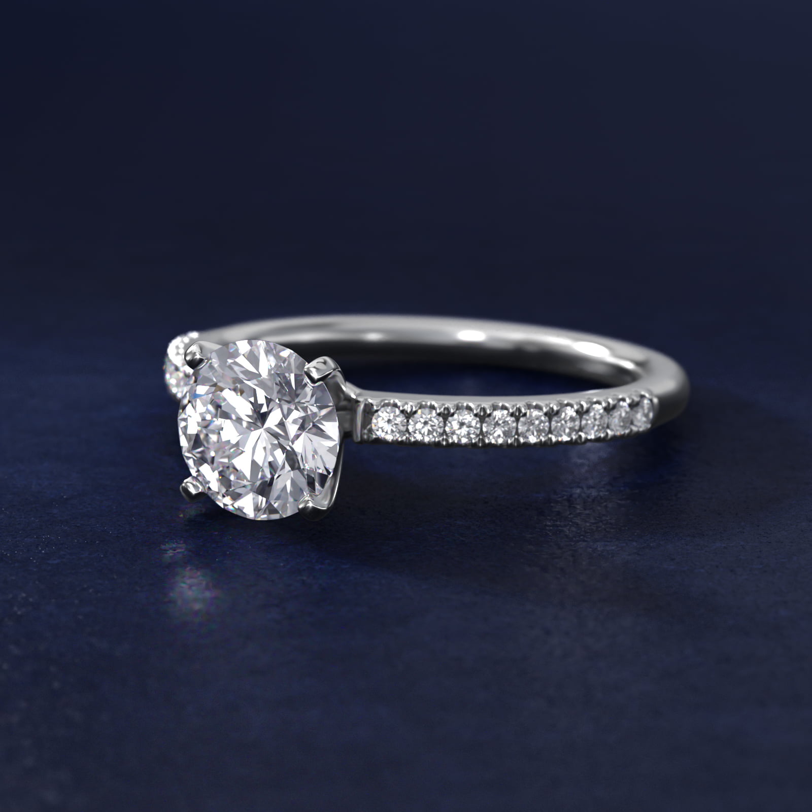 Riviera Pavé Diamond Engagement Ring in 18k White Gold (1/6 ct. tw.)