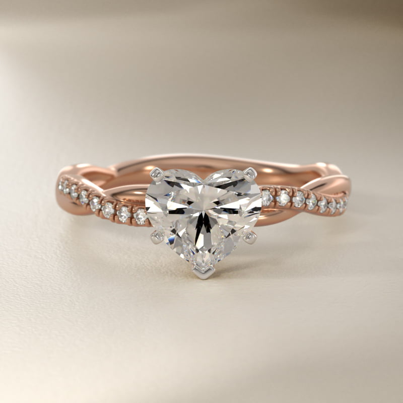 Petite Twist Diamond Engagement Ring in 14k Rose Gold (1/10 ct. tw.)
