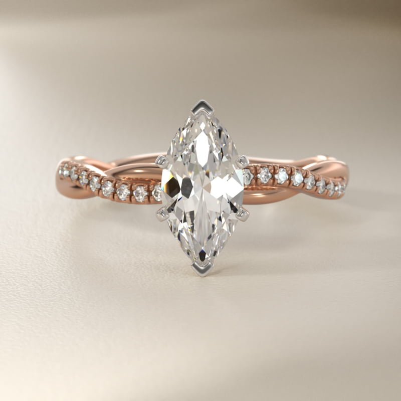Petite Twist Diamond Engagement Ring in 14k Rose Gold (1/10 ct. tw.)