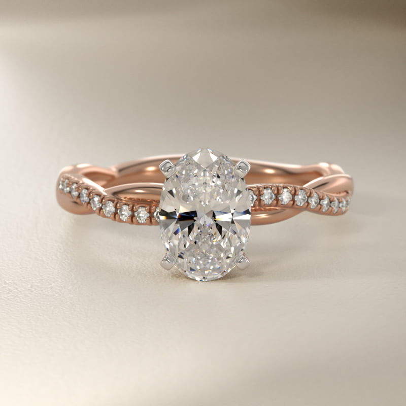 Petite Twist Diamond Engagement Ring in 14k Rose Gold (1/10 ct. tw.)