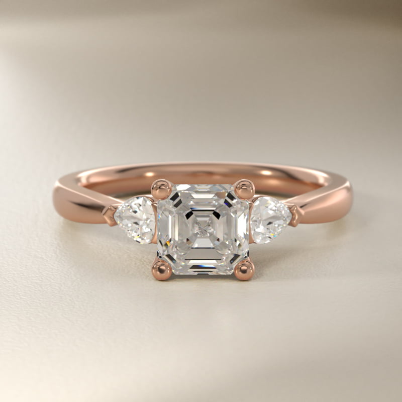 Pear Sidestone Lab-Grown Diamond Engagement Ring in 14k Rose Gold (1/4 ct. tw.)