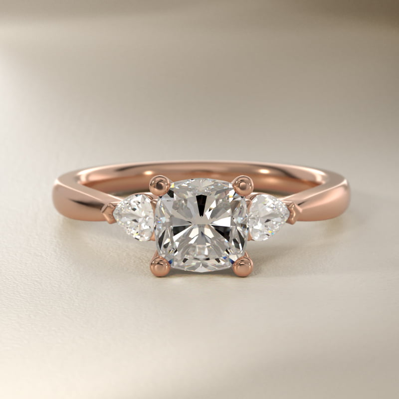 Pear Sidestone Lab-Grown Diamond Engagement Ring in 14k Rose Gold (1/4 ct. tw.)