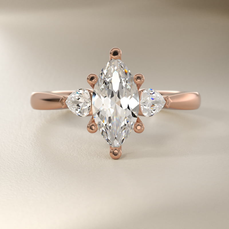 Pear Sidestone Lab-Grown Diamond Engagement Ring in 14k Rose Gold (1/4 ct. tw.)