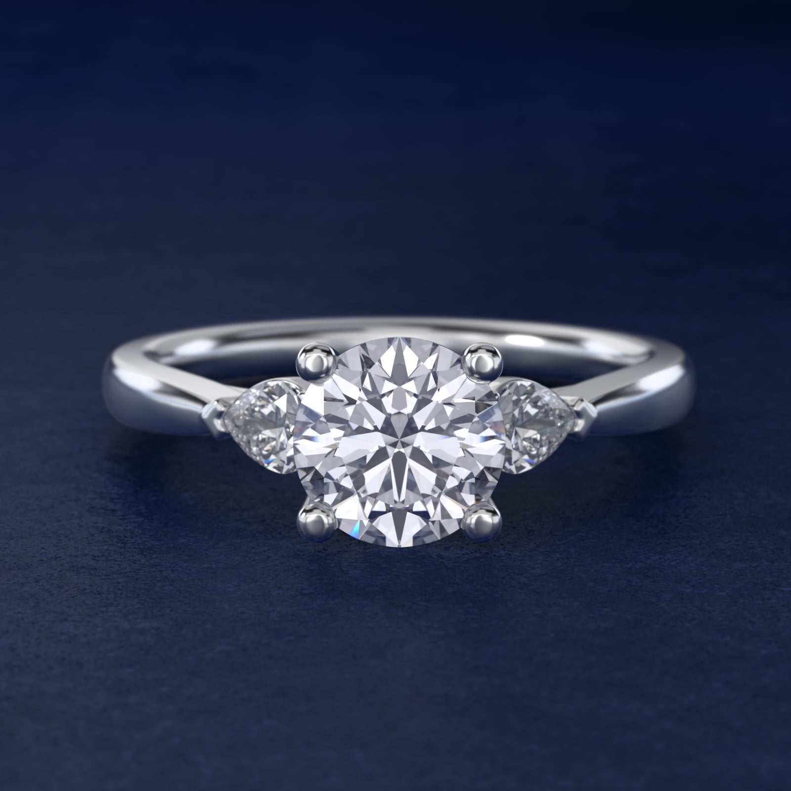 Pear Sidestone Diamond Engagement Ring in Platinum (1/4 ct. tw.)