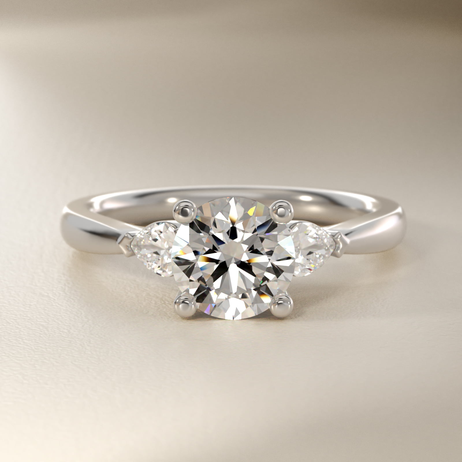 Pear Sidestone Lab-Grown Diamond Engagement Ring in 18k White Gold (1/4 ct. tw.)
