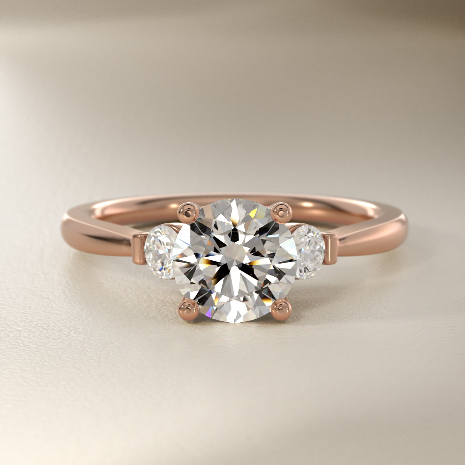 Petite Three-Stone Diamond Engagement Ring in 18k Rose Gold
