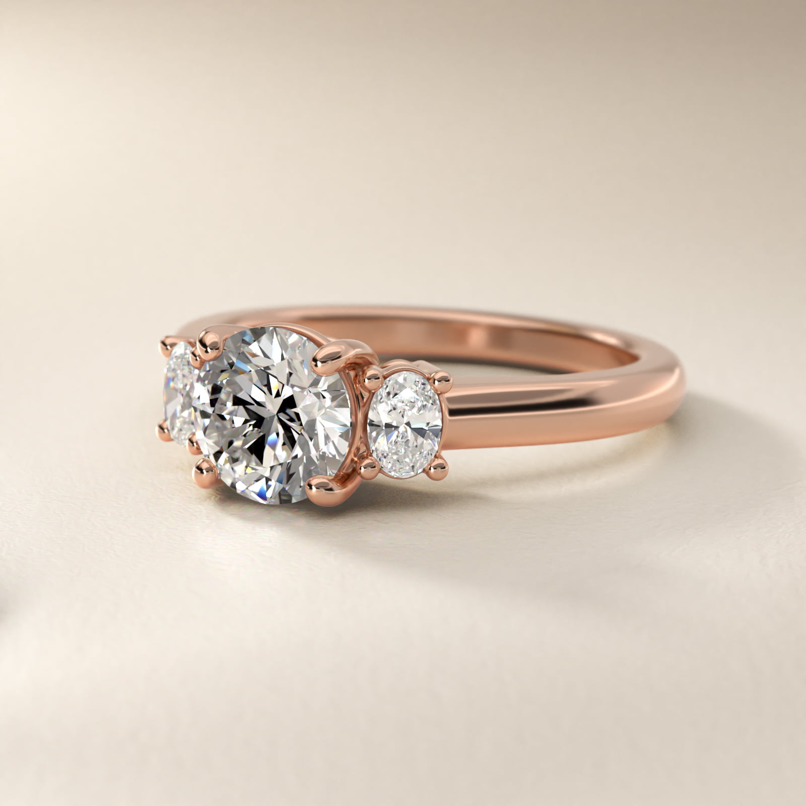Oval Three-Stone Diamond Engagement Ring in 18k Rose Gold (1/3 ct. tw.)