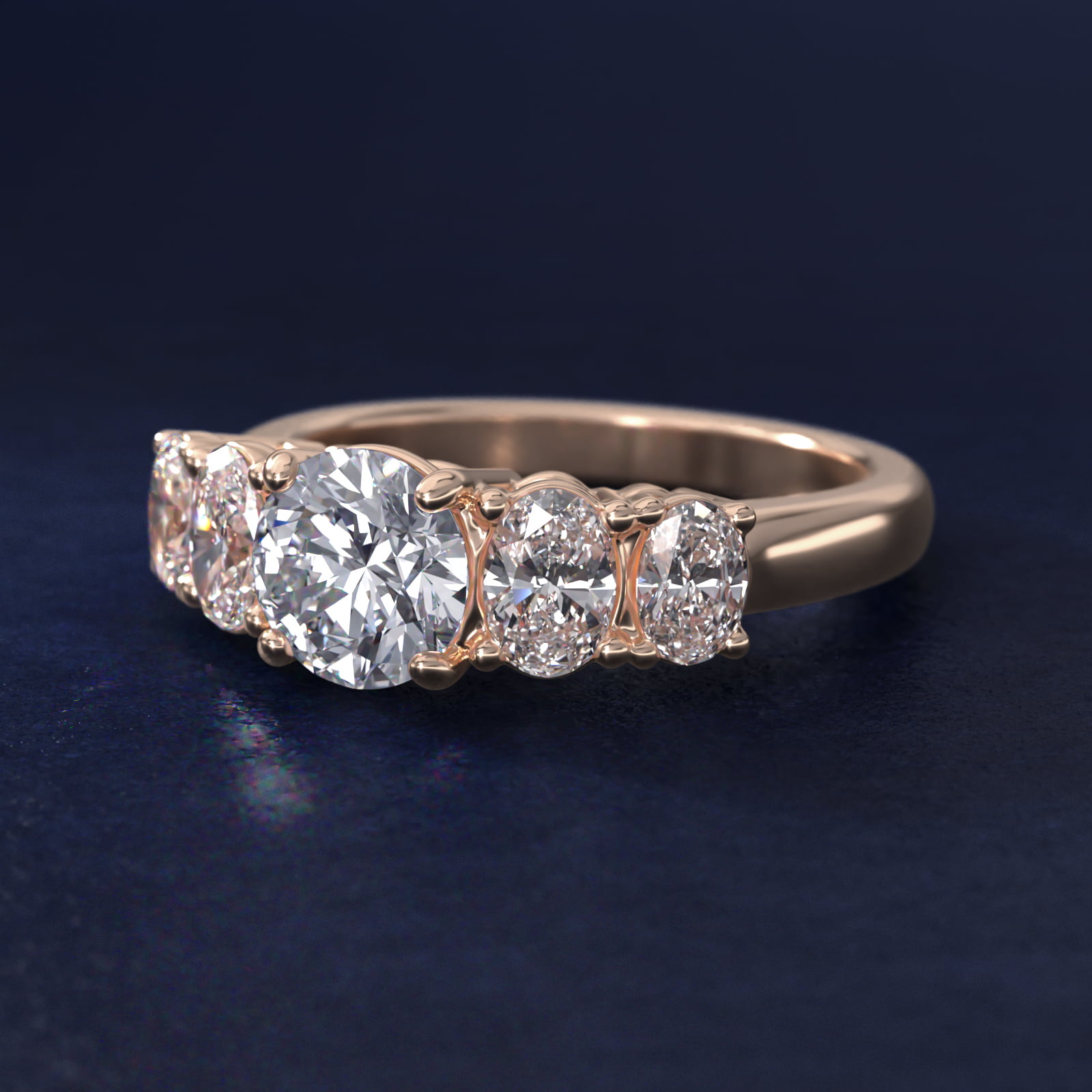 Graduated Oval Diamond Engagement Ring in 18k Rose Gold (1/2 ct. tw.)