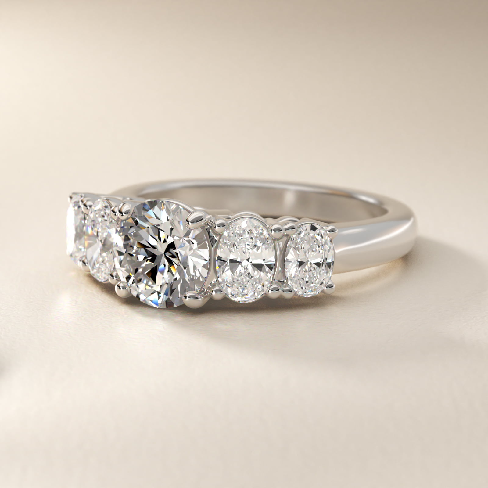 Graduated Oval Diamond Engagement Ring in Platinum (1/2 ct. tw.)
