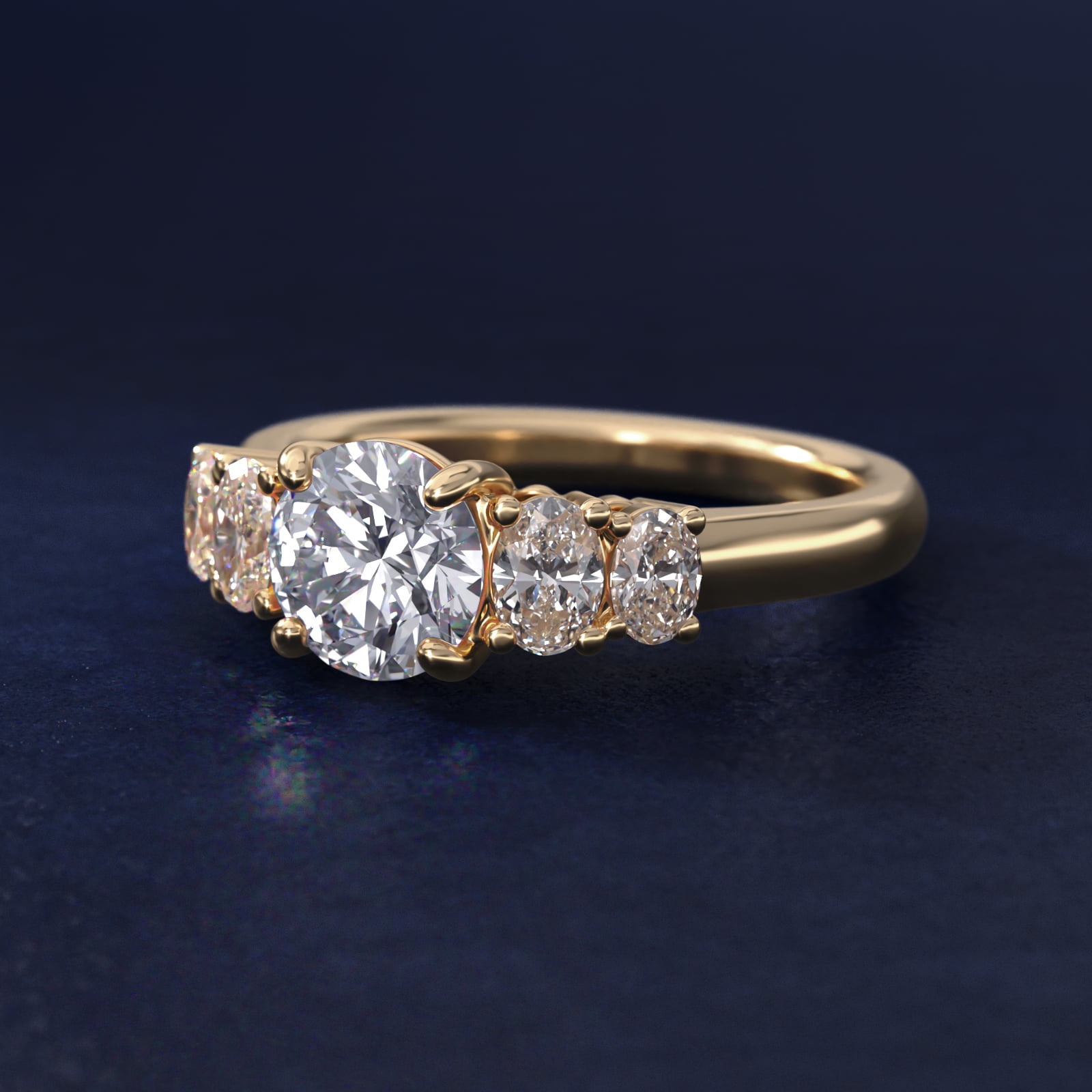 Graduated Oval Diamond Engagement Ring in 14K Yellow Gold (7/8 ct. tw.)