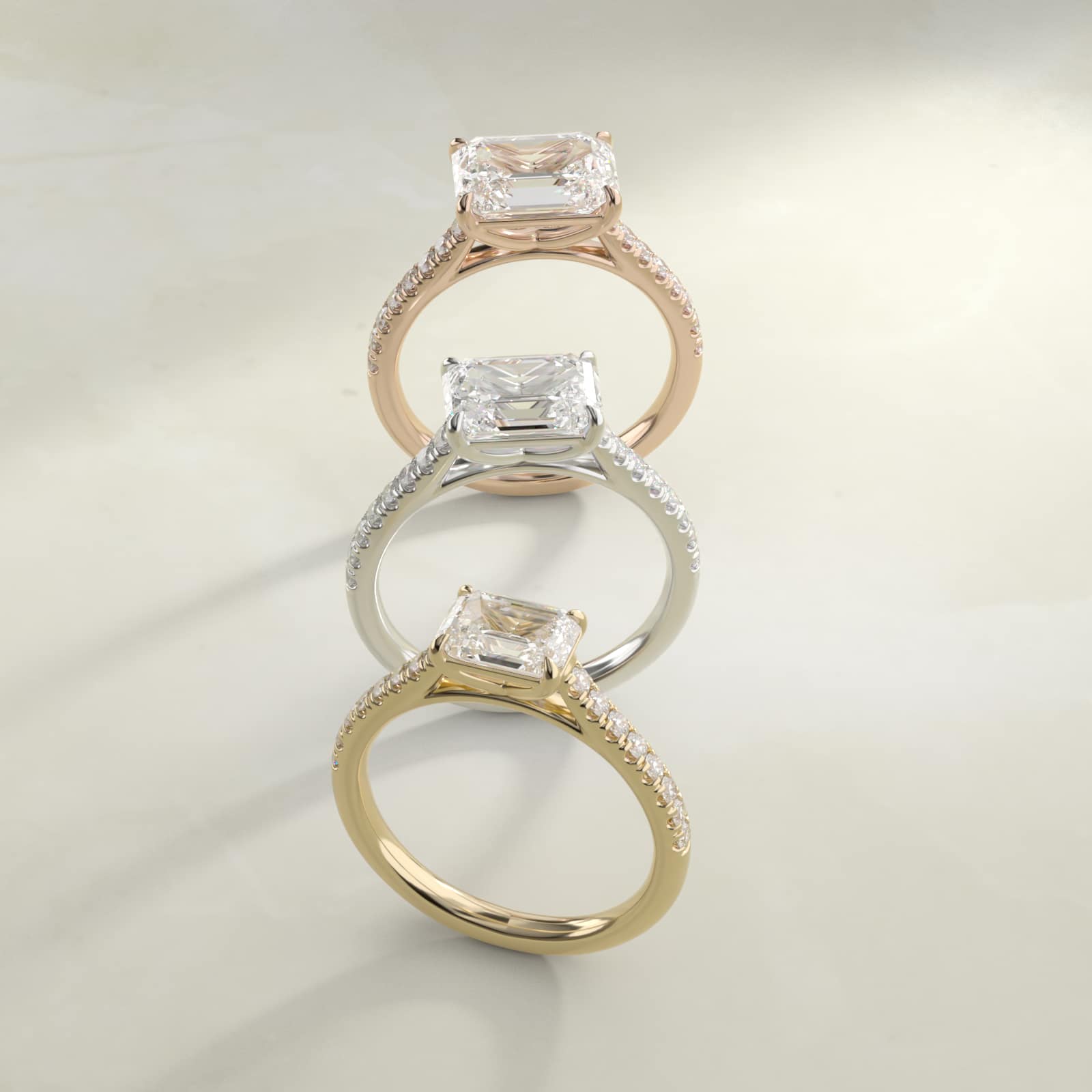 Emerald cut diamond engagement ring yellow gold with clean solitaire band