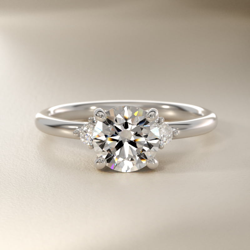 Petite Three Diamond Engagement Ring in Platinum (1/10 ct. tw.)