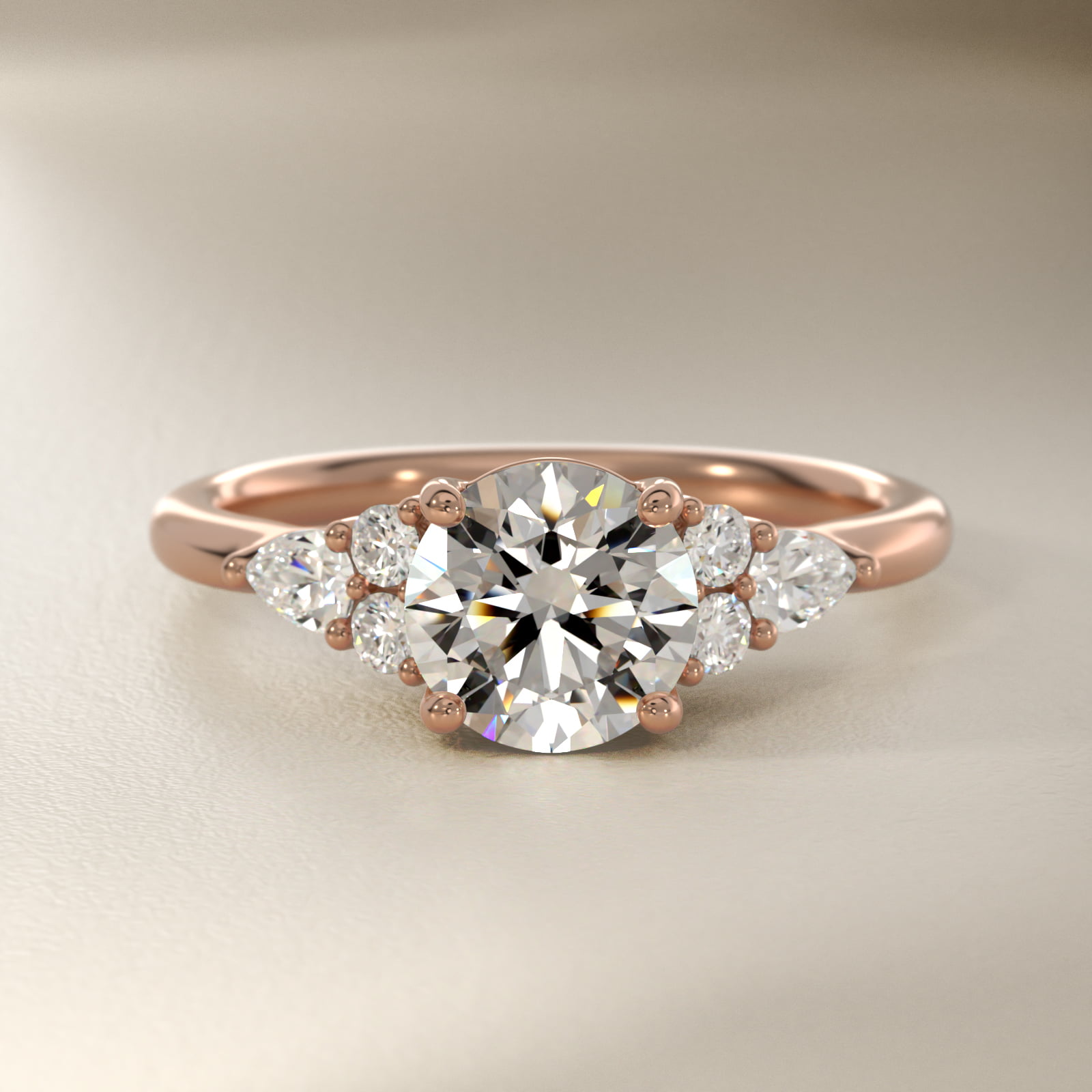 Petite Pear and Round Diamond Engagement Ring in 14k Rose Gold (1/4 ct. tw.)