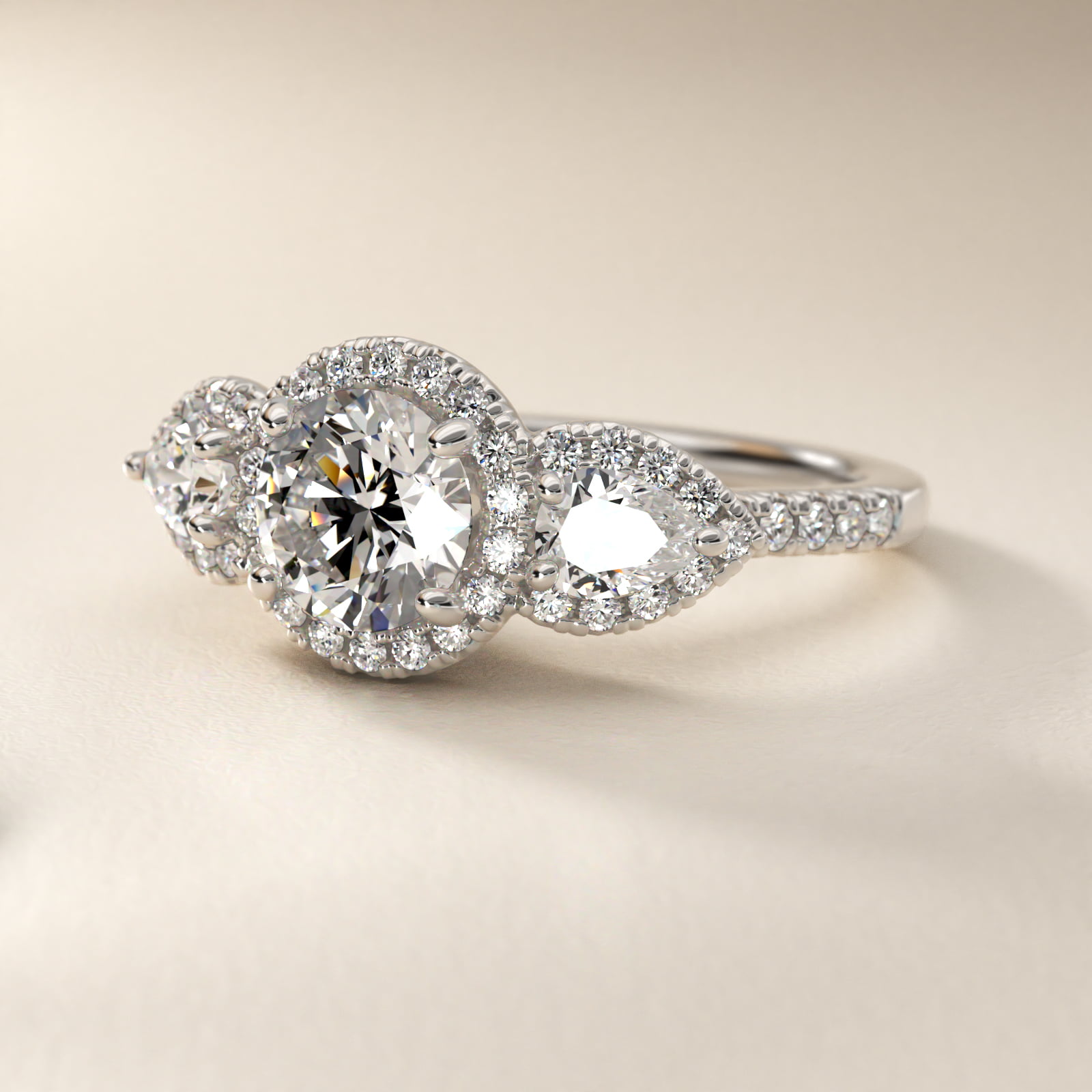 Three-Stone Pear Halo Diamond Engagement Ring in 18k White Gold