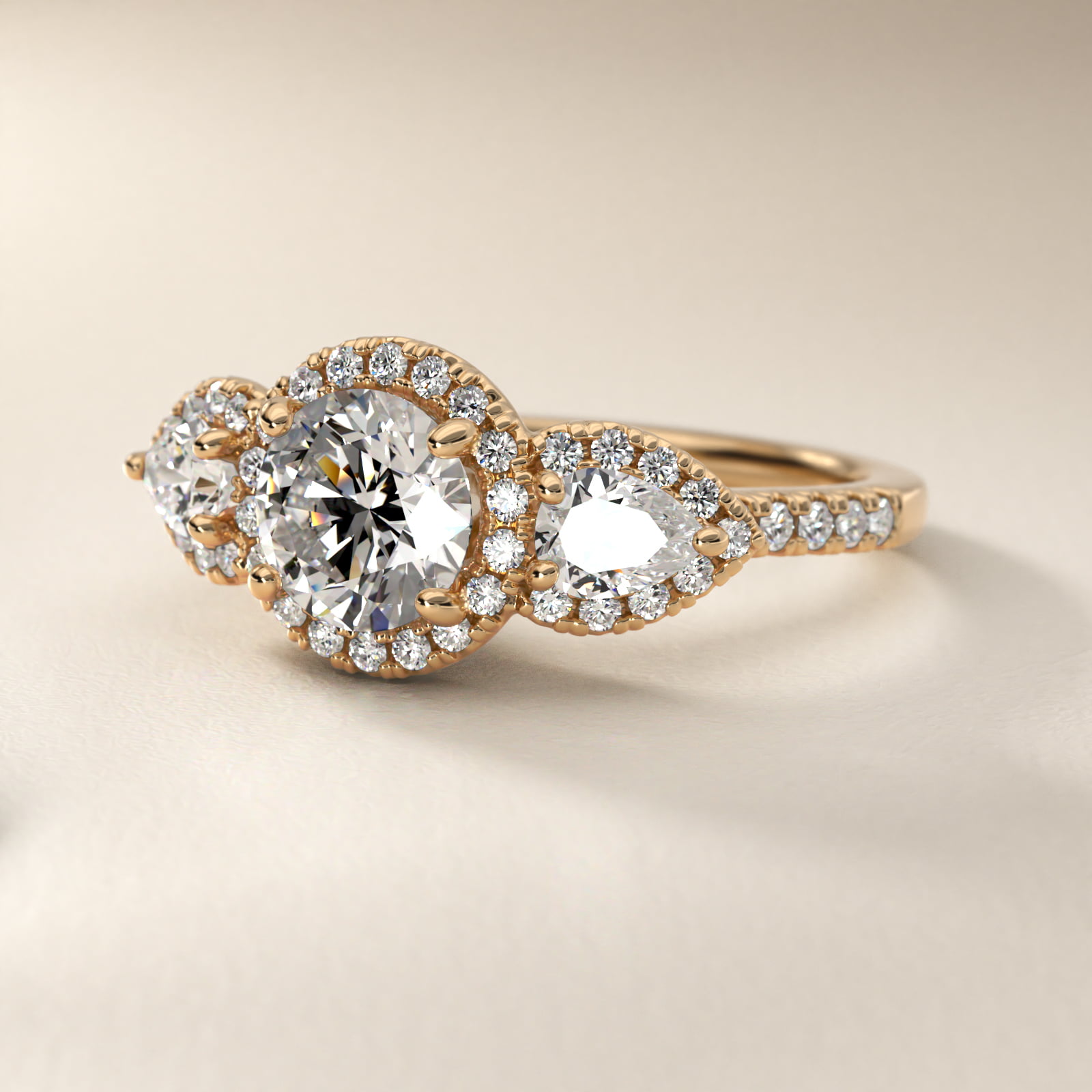 Three-Stone Pear Halo Diamond Engagement Ring in 18k Yellow Gold