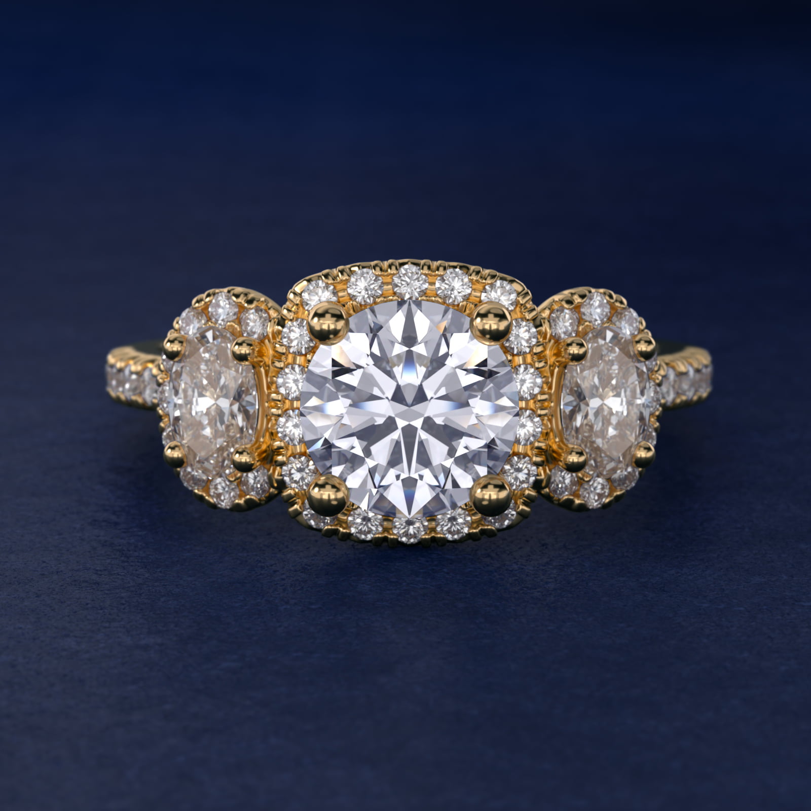 Three-Stone Oval Halo Diamond Engagement Ring in 14k Yellow Gold