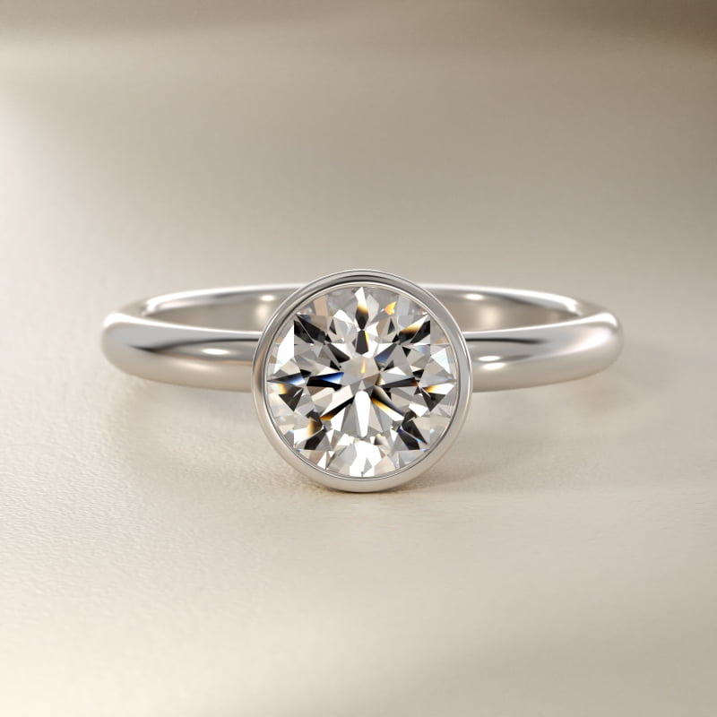 Bezel Solitaire Engagement Ring in Platinum